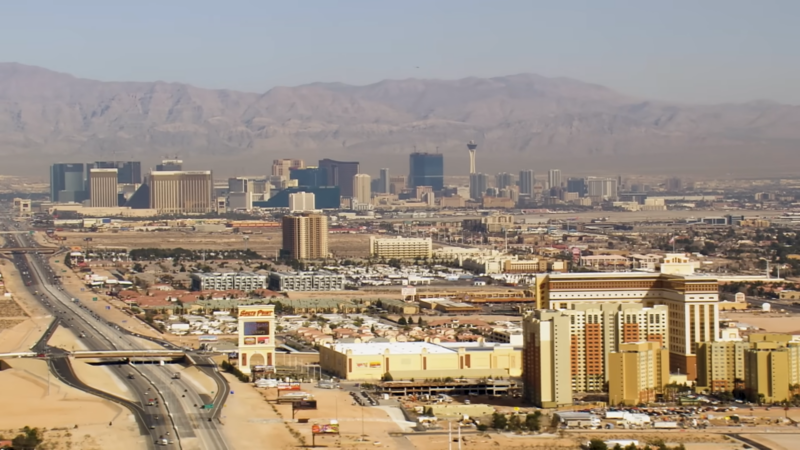 Aerial View of Las Vegas Showing the City Skyline with Surrounding Desert and Mountains