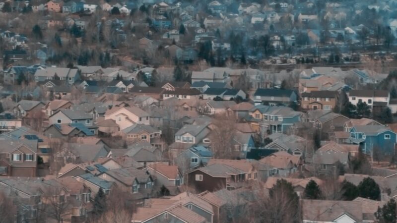 An Aerial View of A Suburban Neighborhood in Colorado, Showcasing Rows of Houses and Densely Packed Residential Buildings, Representing the Household and Family Structure in The Region