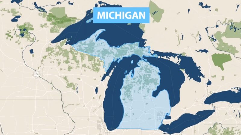 This Image Shows a Map of Michigan Highlighting Population Density Regions, with Lighter Blue Areas Representing Higher Population Concentrations and Green Areas Indicating Forested or Rural Regions