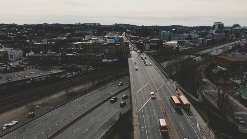 Aerial View of A Busy Highway System Showing Boston's Population and Cityscape