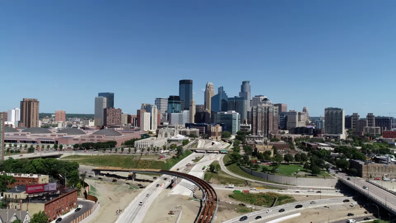 The Image Shows a View of Downtown Minneapolis, Highlighting Ongoing Construction and Development, Representing the City's Historical and Ongoing Population Growth