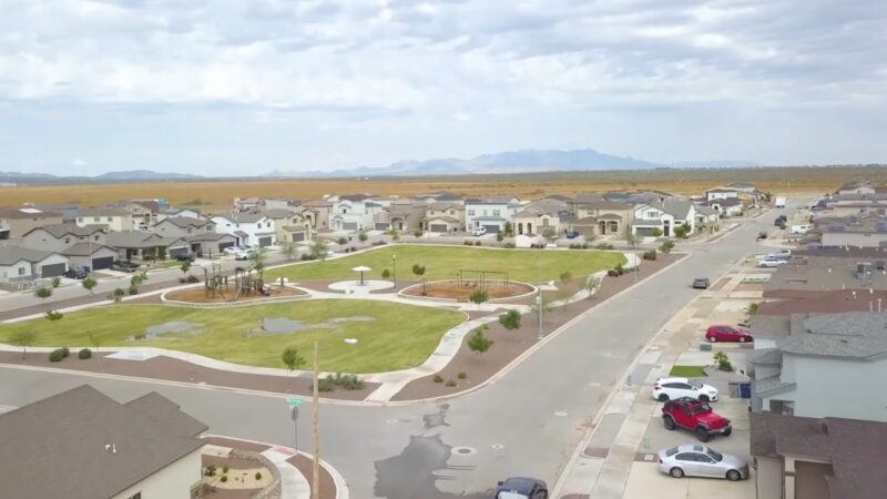 Aerial View of A Suburban Neighborhood in El Paso Featuring Modern Homes and A Green Park, Representing the Concept of Median Home Value in The Area