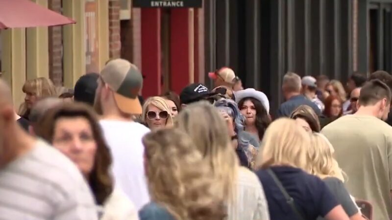 A Crowded Street in Nashville Filled with Pedestrians, Highlighting the City's Increasing Population and Bustling Urban Life