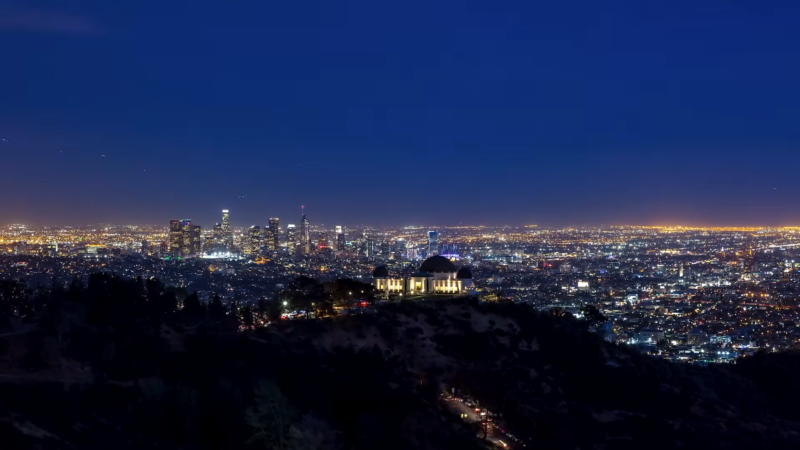 Nighttime View of Los Angeles, Showcasing the Cityscape with Lights Sprawling Under a Dark Sky, from A High Vantage Point