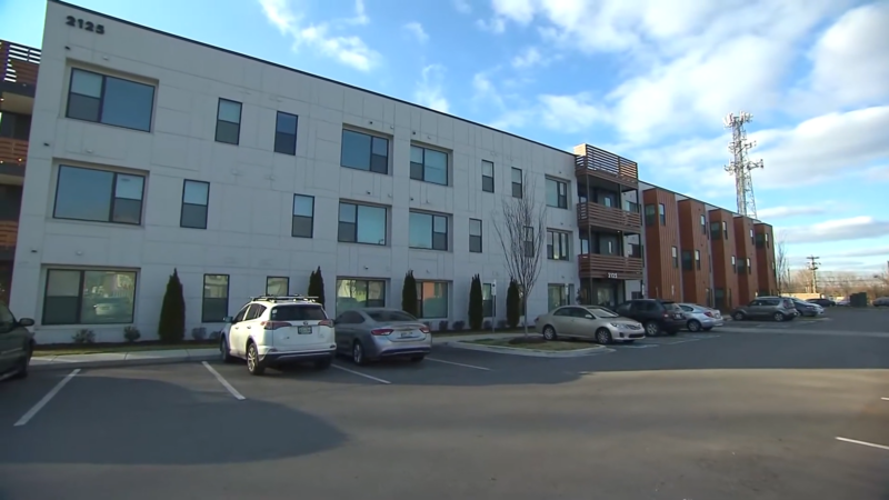 A Modern Apartment Building with A Parking Lot, Representing the Urban Development and Housing Expansion in Nashville