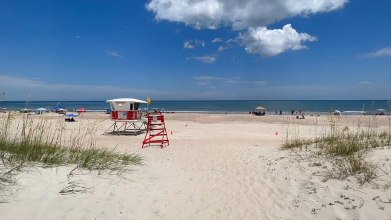 A Sunny View of Amelia Island Beach with A Lifeguard Stand