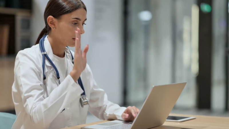 A Healthcare Professional Participates in An Online Nursing Program Through Video Communication