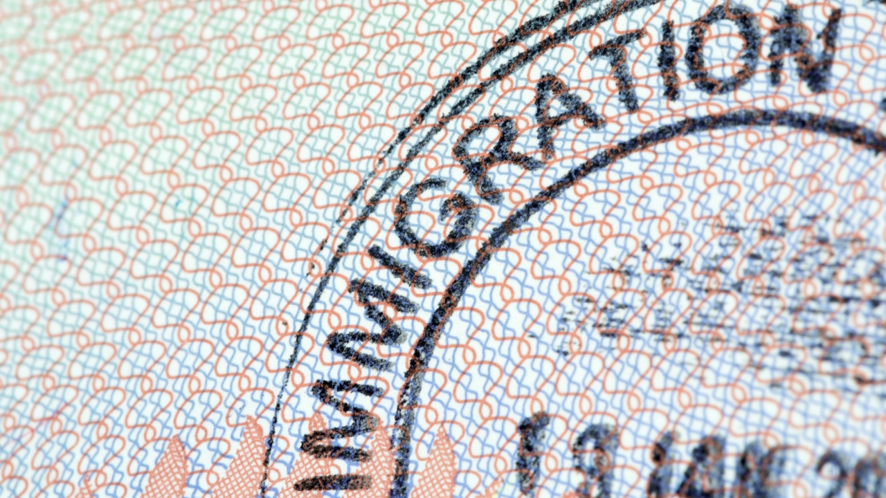 Close-up of an immigration stamp on a travel document