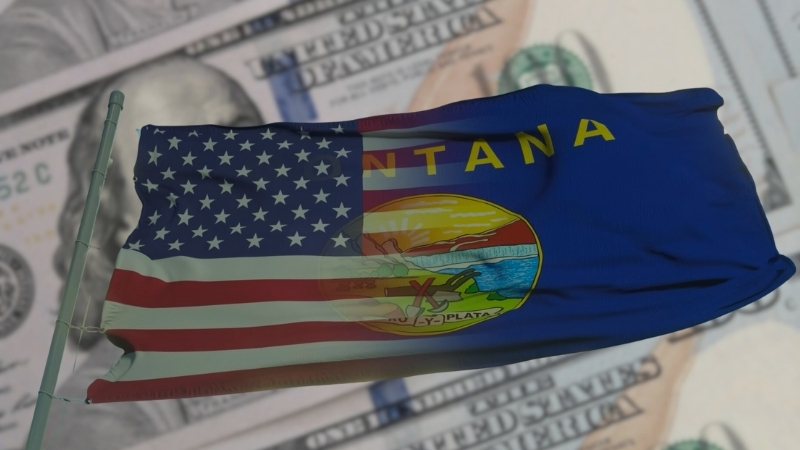 The Image Shows a Montana State Flag Overlaying U.S. Dollar Bills, Representing Income or Financial Themes Related to The State of Montana