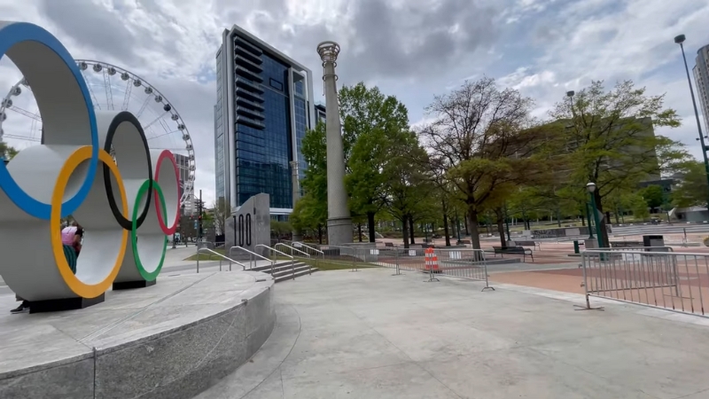 Centennial Olympic Park in Atlanta Featuring the Olympic Rings Sculpture and Nearby Ferris Wheel