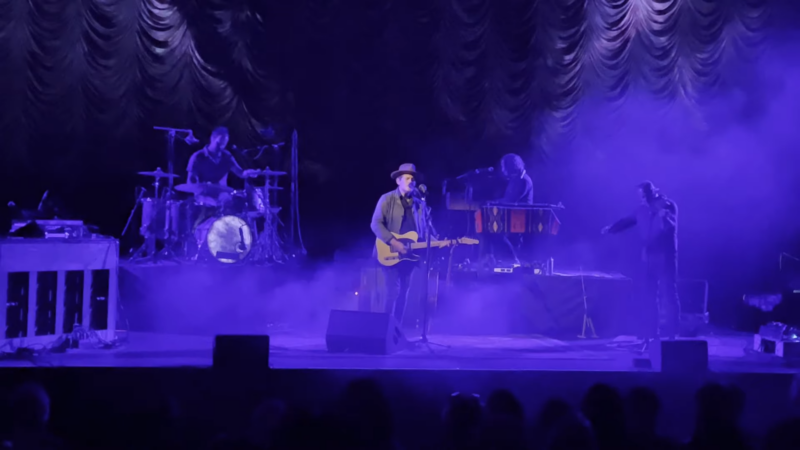 A Live Music Performance on A Purple-Lit Stage at Crest Theatre in Sacramento