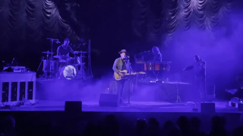 A Live Music Performance on A Purple-Lit Stage at Crest Theatre in Sacramento