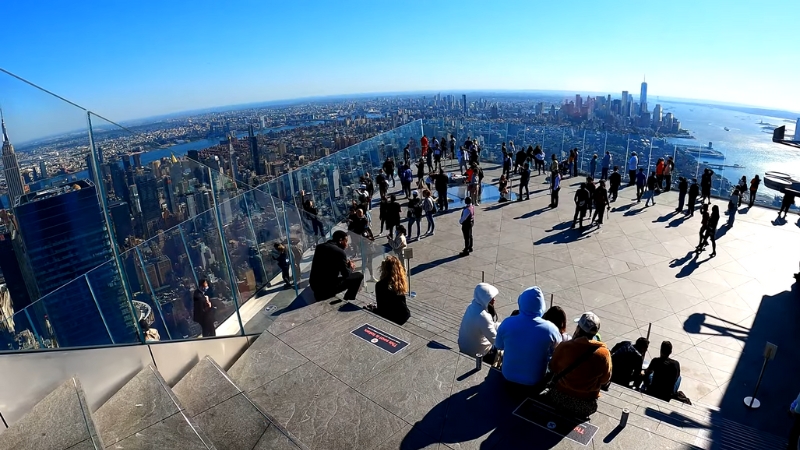 Visitors Enjoying Panoramic Views of Manhattan and Beyond from The Edge Observation Deck in New York City