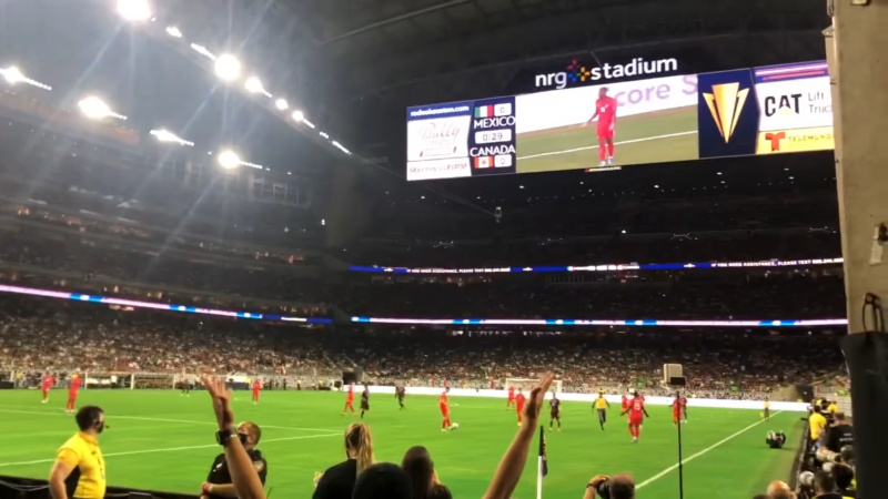 Fans Watch a Soccer Match at NRG Stadium in Houston, Texas