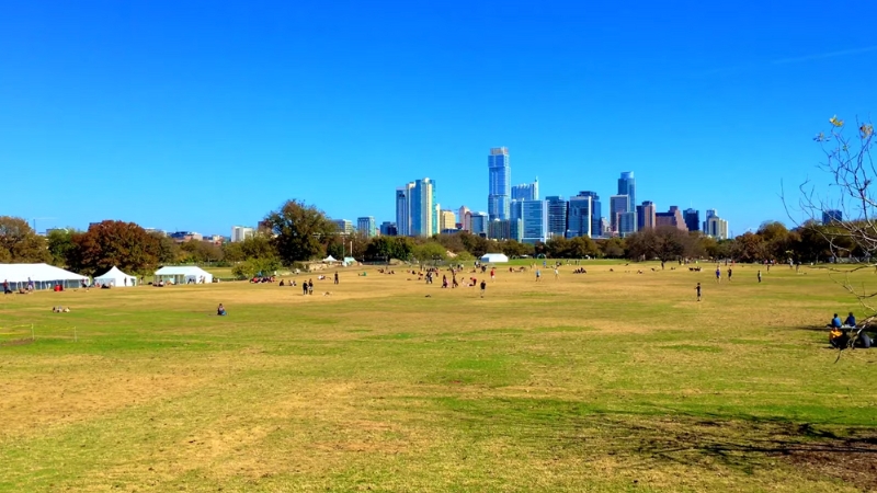 Zilker Park in Austin, Texas, with The City Skyline in The Background