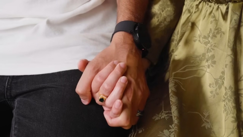 Two People Holding Hands, Representing how Religious Differences Affect Relationships