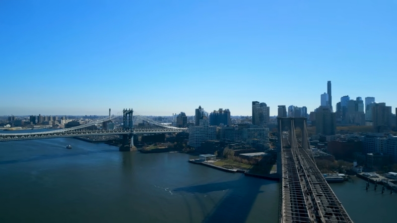 A View of The Brooklyn Bridge and New York’s Skyline, Reflecting the City’s Potential Population Decline