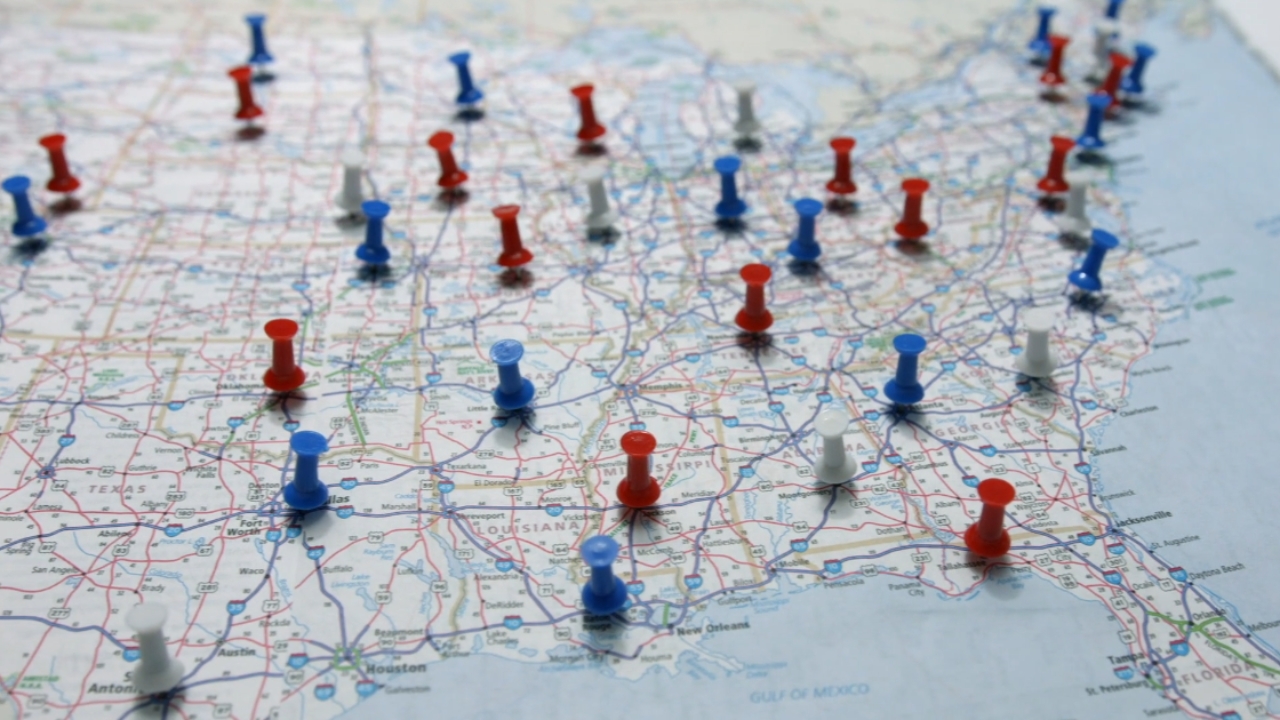 A map of the southeastern United States is marked with colored pushpins