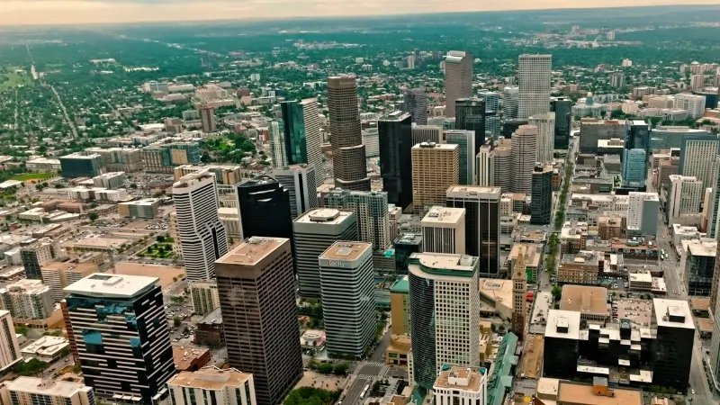 Aerial View of Downtown Denver Showcasing Its High-Rise Buildings, Reflecting the Growing Denver Population