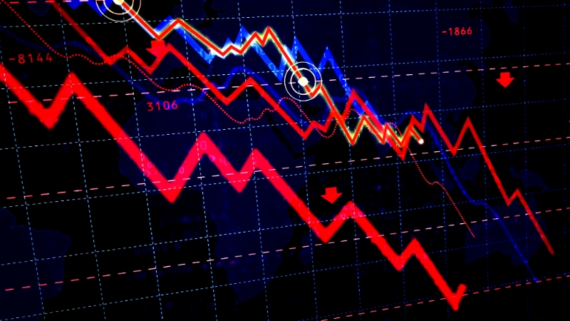 Graph showing a downward trend with red arrows, indicating a decline in values