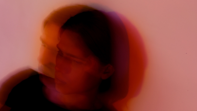 A blurred photo of a person shows the emotional effect of bipolar disorder