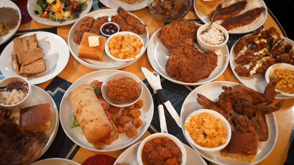 A table full of Southern comfort food in Charleston, showcasing why it’s one of the best US cities to visit for culinary travel
