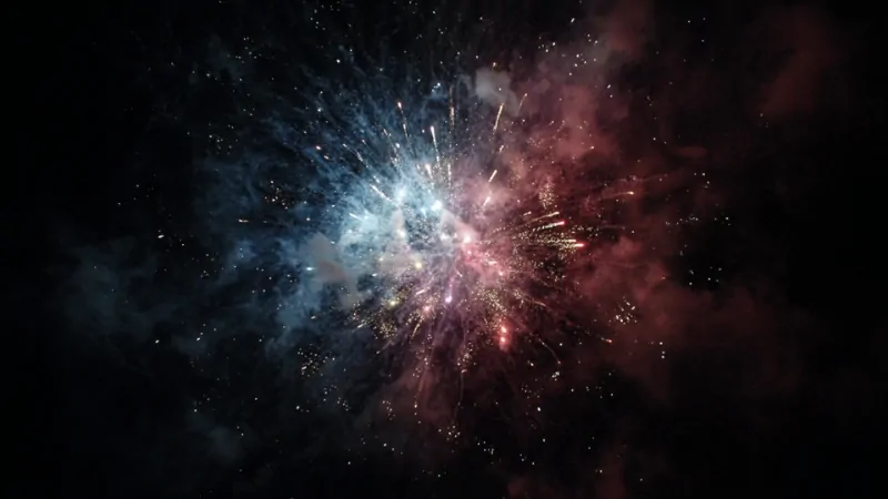 Fireworks burst in the night sky, symbolizing joy and unity during Americaโs most celebrated holidays