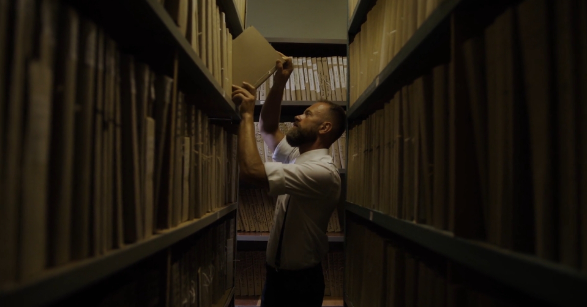 A man searches archival shelves inside one of America’s public libraries