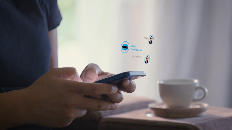 Person using a smartphone with chatbot interface, illustrating reliability risks in customer support chatbots