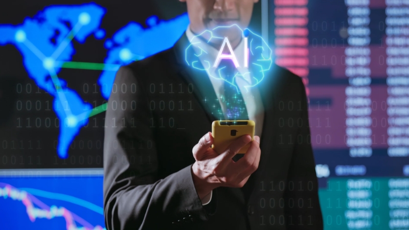 Man in a suit holding a phone with a glowing AI icon and data screens in the background