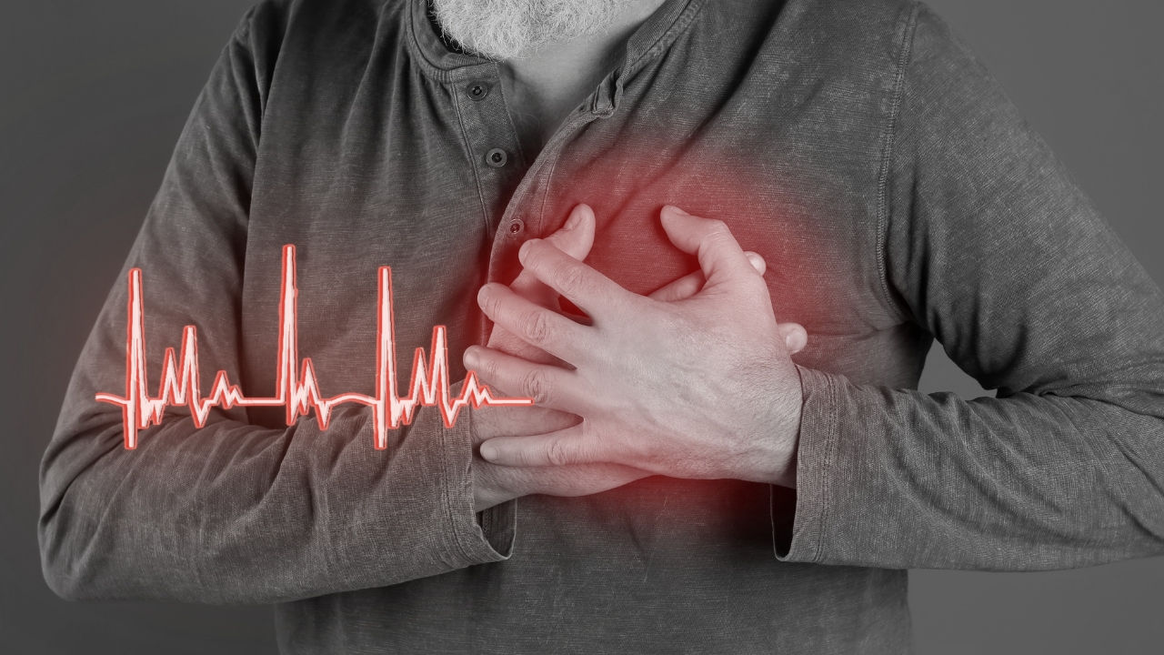 Man holding his chest with highlighted pain area to represent heart attack and stroke risk