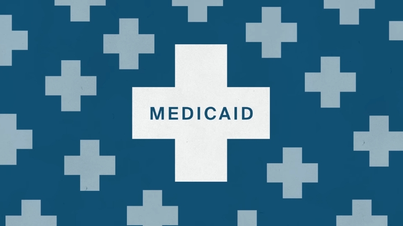 Medicaid sign on a medical background, showing rising costs despite lower enrollment