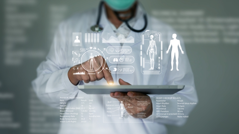 Doctor reviewing digital patient records and analytics on a tablet through a modern electronic health record system