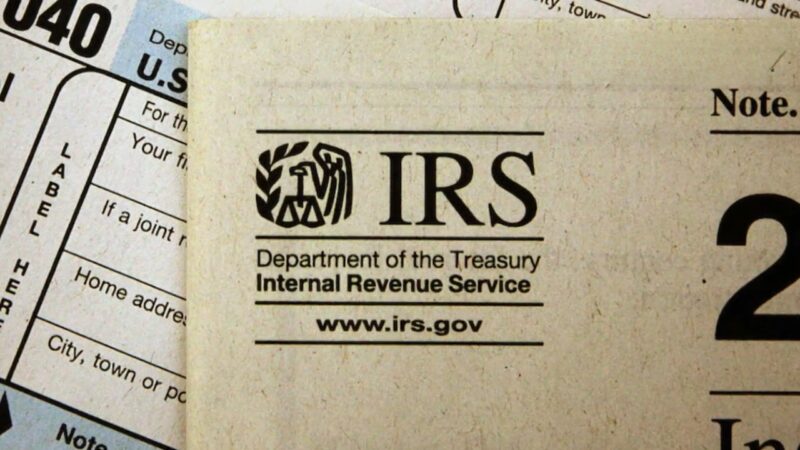 IRS notice with logo on tax documents used to illustrate scam risks by text, email, and phone