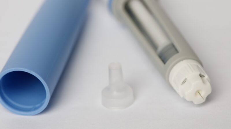 Close-up of a semaglutide injection pen with needle and cap removed
