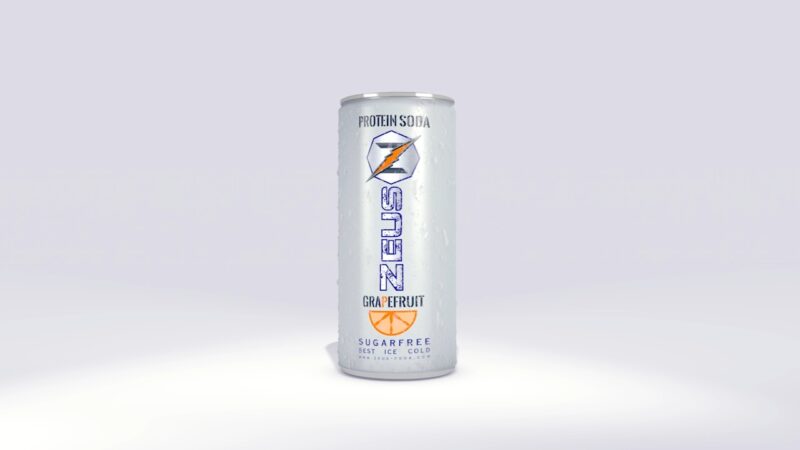 Can of grapefruit protein soda with sugar-free label on a clean background