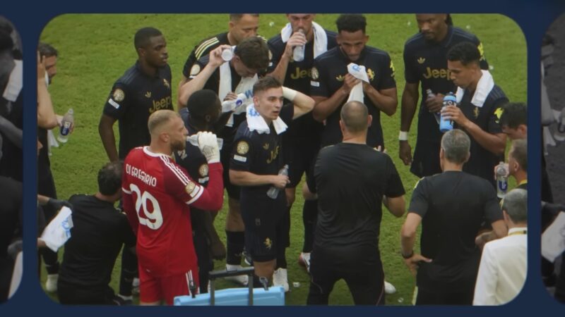 Football players hydrate and cool down during a match in hot conditions