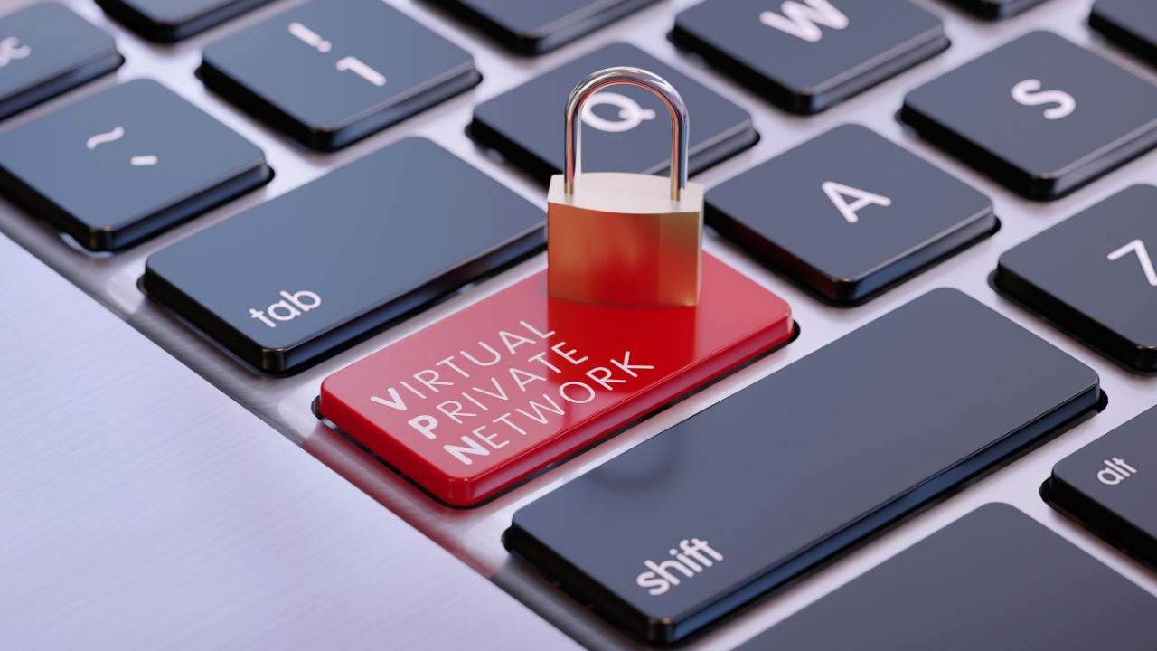 A locked VPN key on a keyboard shows the privacy debate around age-gated access