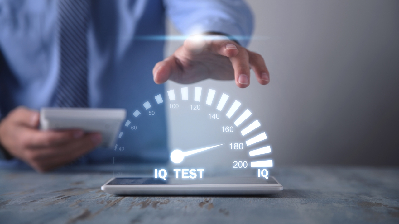 Person uses a digital IQ test gauge on a tablet