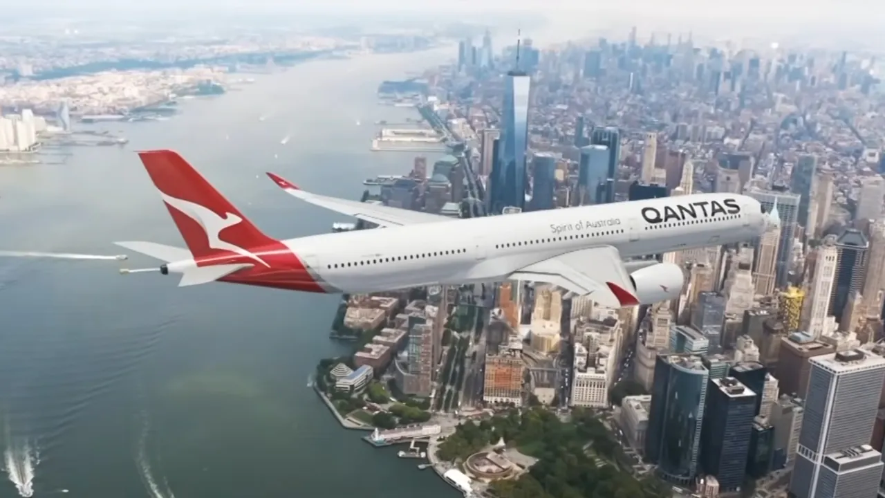 Qantas aircraft flies above New York City skyline