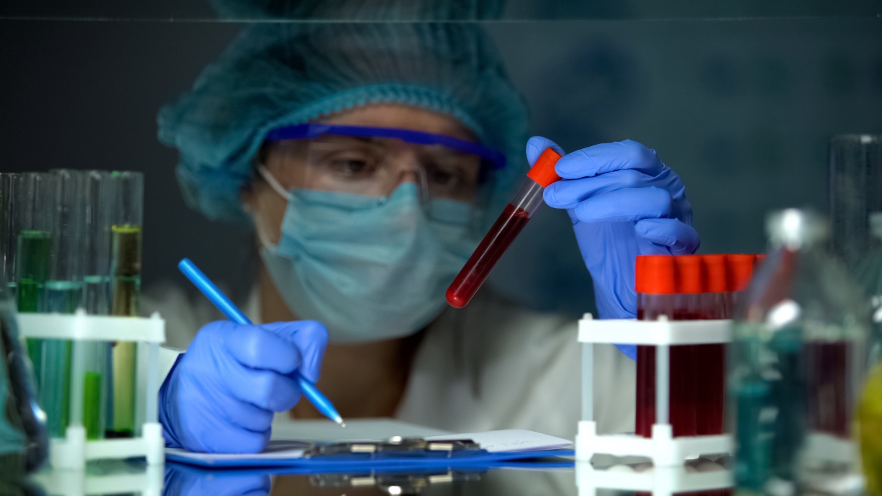 Scientist tests blood samples in a laboratory