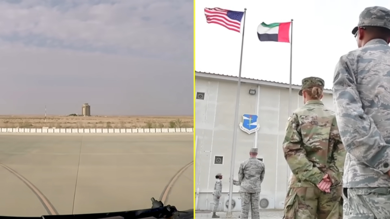 U.S. service members stand at an overseas base beside American and UAE flags